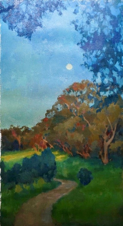 Under a white moon in a blue sky framed in blue leaves, a road winds through grass and trees.